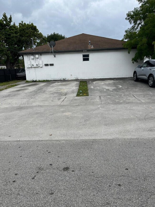 Building Photo - 8180 NW 23rd Ave Unit A