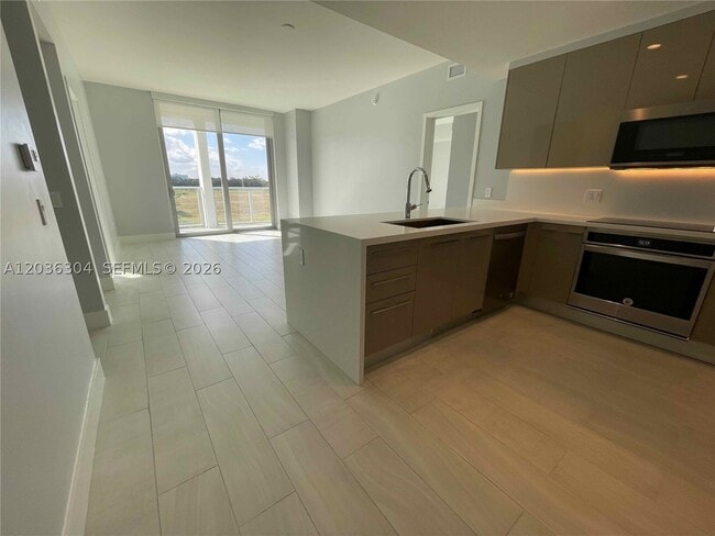Building Photo - 2000 Metropica Wy Unit 307