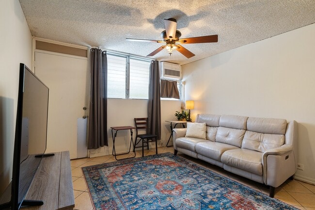 Photo - Furnished 1 Bed 1 Bath Condo. Includes Electric, Water, Sewer & Gas. Ample unassigned parking. Unit 205