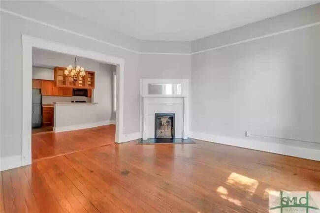 Livingroom is open to kitchen - 117 Lincoln St Unit 6A