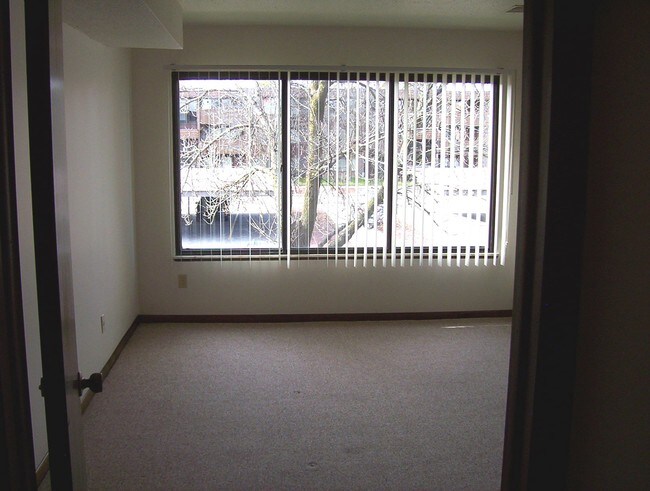 Large bedroom windows let in lots of natural light.