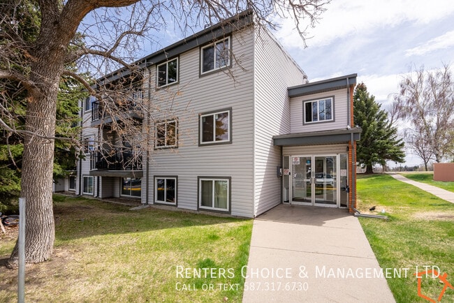 Building Photo - 1 Bedroom Condo, Assigned Parking, Utilities Included