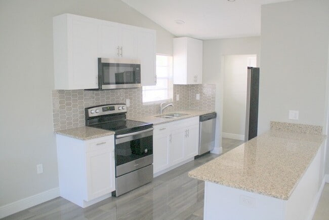 Photo - Beautifully updated over size 2 bed 2 bath 1 car garage home!