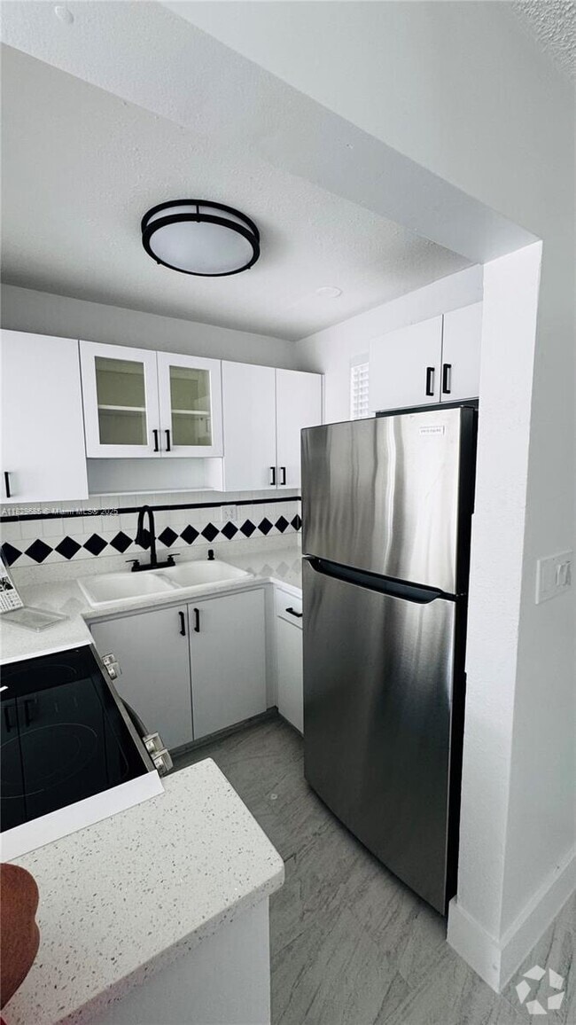 Building Photo - 2385 NW 11th St Unit A32 Rental