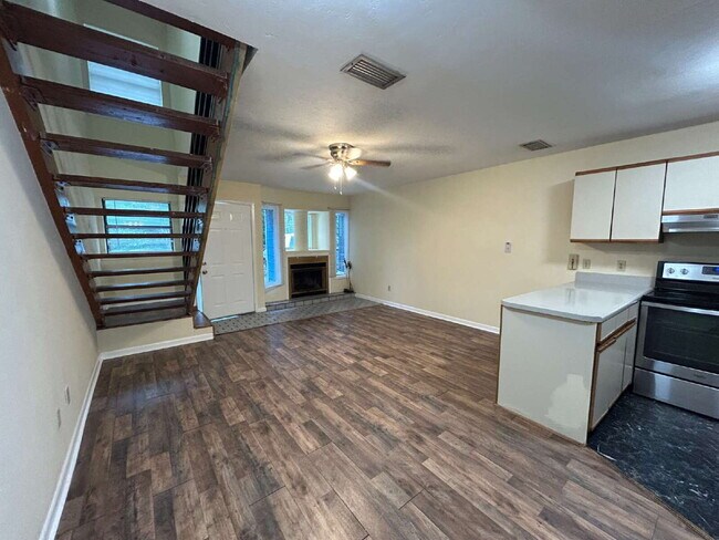 Photo - Spacious 2 bedroom townhouse with an additional loft located near TCC! Unit 3