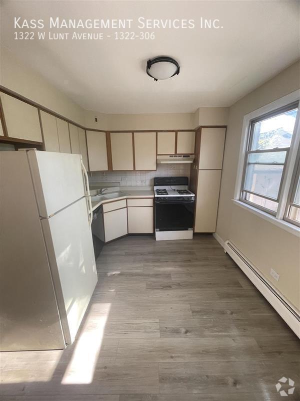 Building Photo - 1322 W Lunt Ave Unit 1322-306 Rental