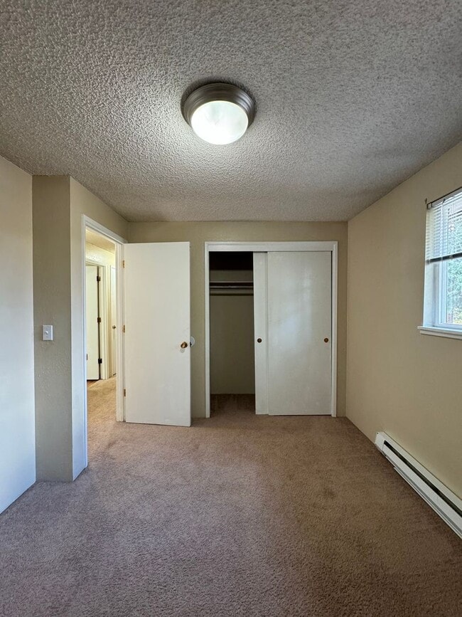 Photo - 2bdrm, 1 bath duplex with attached garage - Water/sewer and garbage included in monthly rent