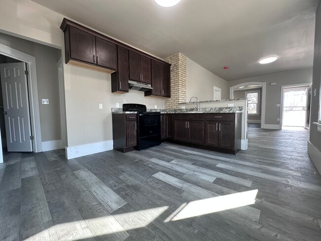 Photo - Large Open Concept 5BR/2BA Rent to Own Home with Office