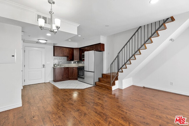 Building Photo - 5633 Carlton Way Unit 203