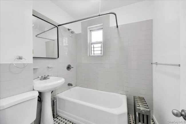 Photo - 1129 E 221st St Unit 3