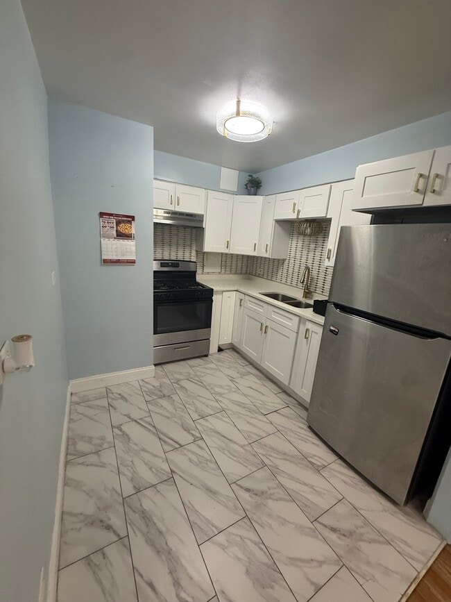 Photo - 6700 S Paxton Ave Unidad 102