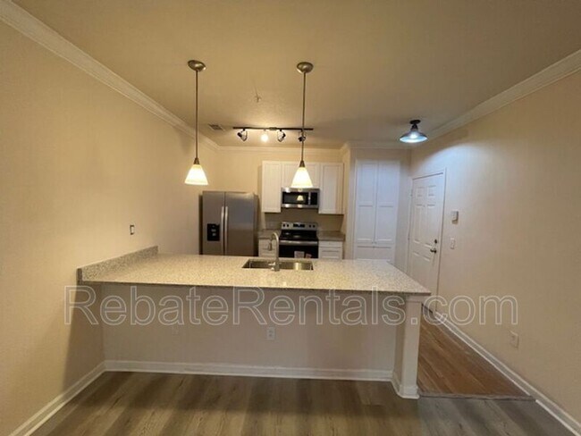 Photo - 8290 Gate Pkwy W Unidad #1314