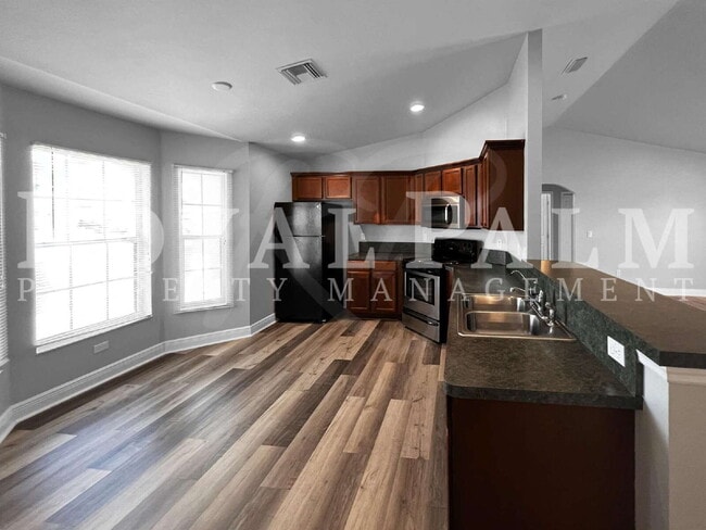 Building Photo - New Year, New House? 3BR/2BA Lehigh Acres Home with Garage, Lawn Care, and Big Main Character Energy