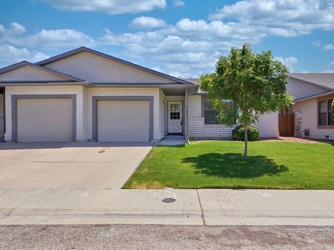 Building Photo - Spacious 2BR Rental with Open Floor Plan & Low-Maintenance yard