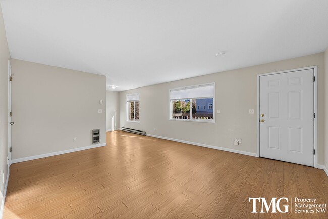 Photo - Private, Sunny Townhome | Carpet Free | Parking & Laundry Included Unit 5121