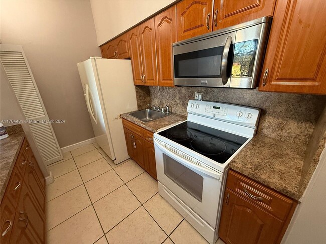 Photo - 7420 W 20th Ave Condo Unit 253