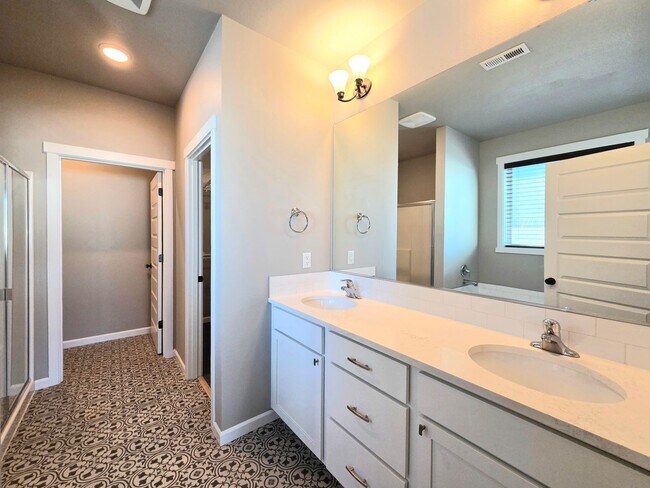 Photo - New 4 Bed Rambler | Fenced Yard | 2-car Garage | Move-In Ready House for Rent in Quincy!