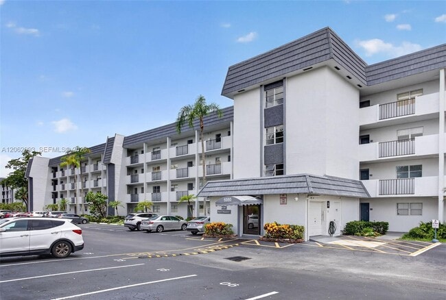 Building Photo - 6080 NW 44th St Unit 410