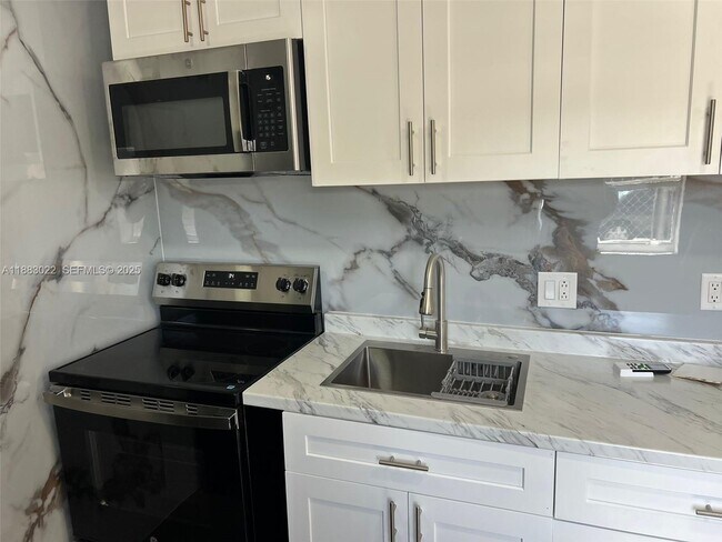 Building Photo - 2674 W 1st Ave Unit 2