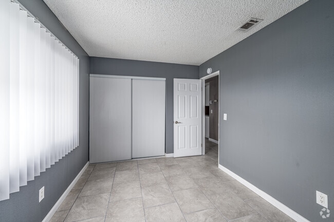 2BR, 1BA - 600SF - Primary Bedroom - White Street Apartments