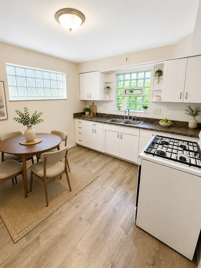 Photo - Charming 3-Bedroom Home with Hardwood Floors, Garage & Private Patio
