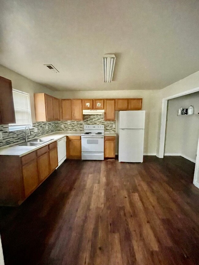 Photo - Must see 4 bedroom 2.5 bath townhouse with 1 car garage .