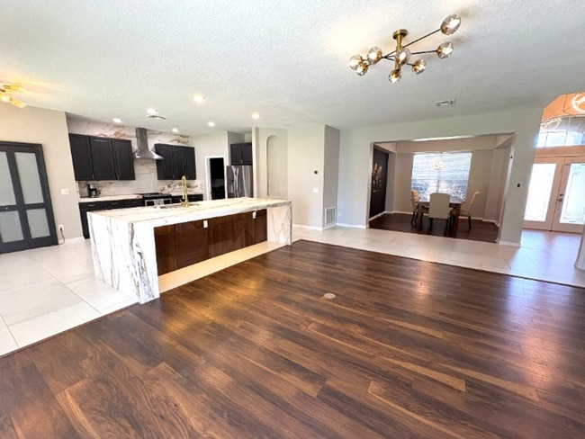 Photo - Available NOW! Stunning 5-Bedroom Home in Gated Avalon Lakes Community