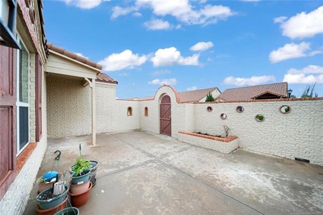 Photo - Welcome to this inviting Mediterranean-style patio home