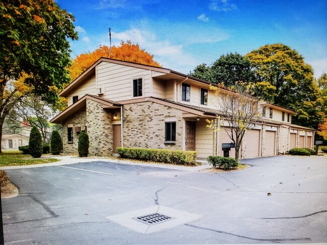 Outside of unit and garage entrance - 401 Cheviot Chase Unit #1