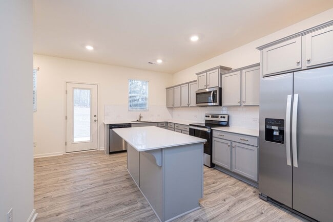 Photo - Charming Townhome community   3br 2.5ba with a cooks kitchen with island minutes from I-85 and sh...