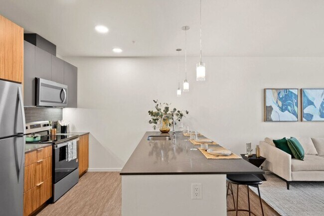 Kitchen island and stainless steel appliances