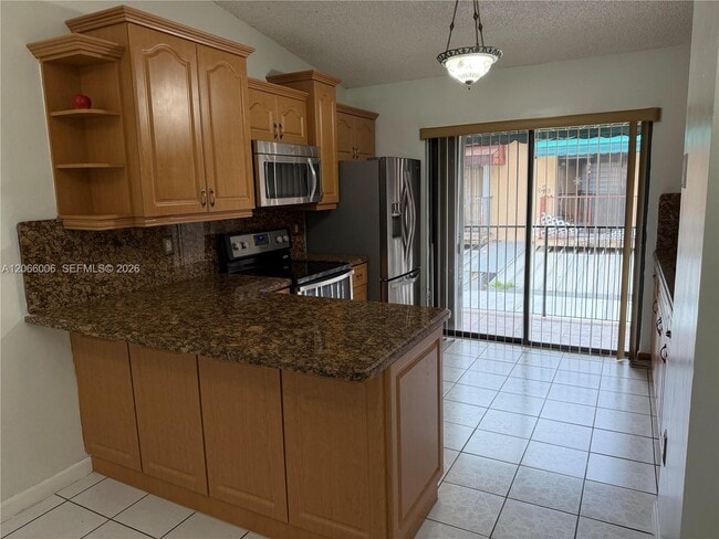 Photo - 7792 W 29th Way Unidad 202