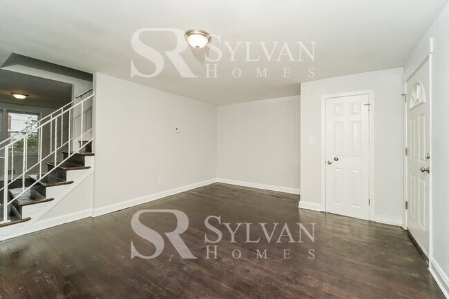 Photo - The living is easy in this 4 bedroom, 2 bathroom townhome