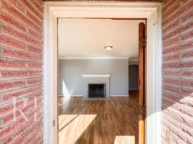 Photo - Timeless Charm Meets Comfort – 2-Bedroom Brick Home with Fireplace & Fenced Yard