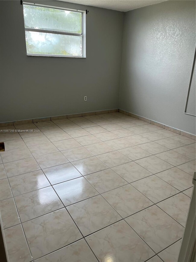 Photo - 666 W 81st St Unit 318