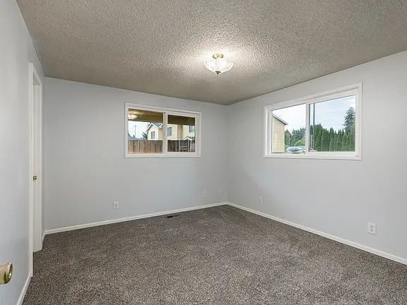 Building Photo - "Charming 3-Bedroom Scappoose Retreat with Cozy Fireplace & 2002 Sq Ft of Comfort!"
