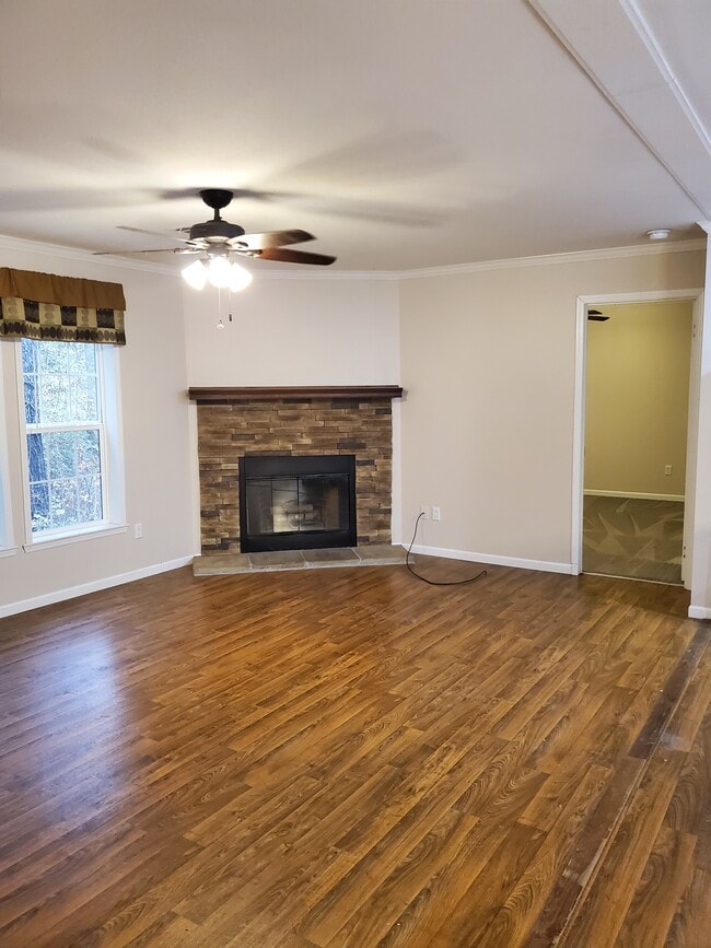 Wood burning fireplace in living room - 2974 Maple Street Unit 2974 Maple St