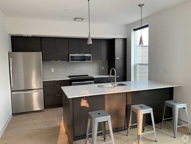 kitchen is fully stocked with dishes, pans, etc. - 718 W Babcock St Unit 200 Rental