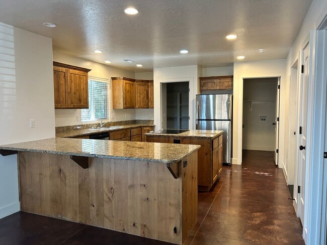 Photo - Dog Friendly 4 Bedroom Townhome. $200 First Full Month's Rent!