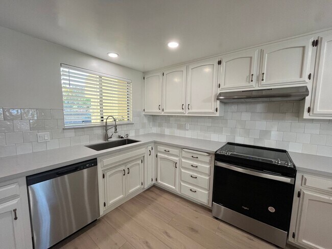 Photo - Updated 2 story Condo in Central Location ...