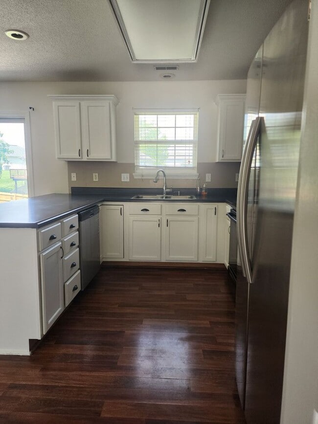 Photo - Single Family Home with Fenced Yard