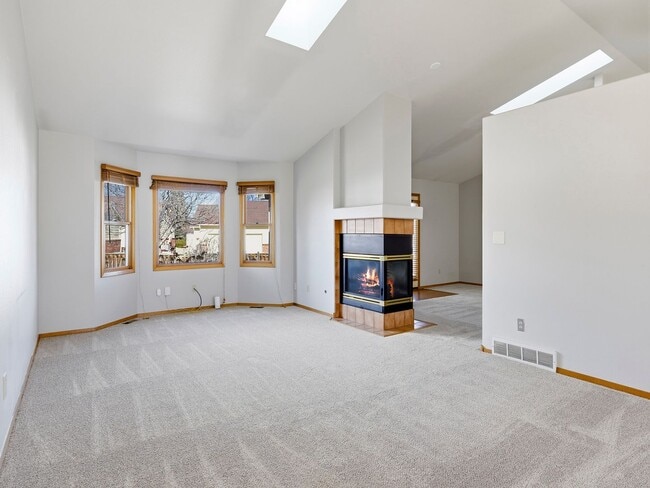 Photo - Beautiful Home with New Carpets, Fenced Yard, A/C, and Finished Basement!