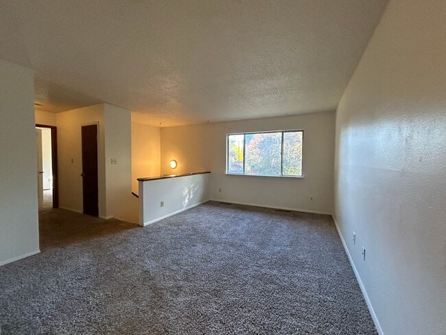 Photo - Beautiful Split-Level 6BR Home with Attached Garage and Fenced Yard +$300 Off First Month!