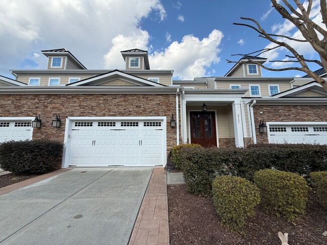 Building Photo - Luxurious 3BD, 4BA Raleigh Townhome with a First Floor Master Bedroom, Bonus Sunroom, and Large U...