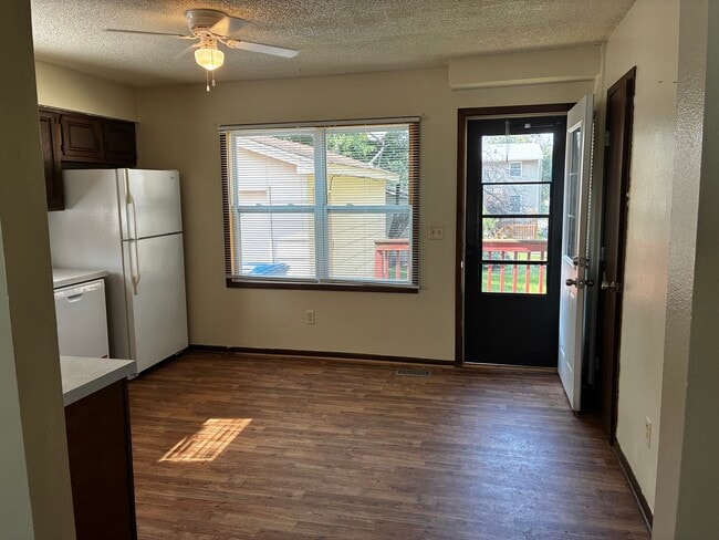 View of the kitchen when walking in from the living room - 1205 Randolph St