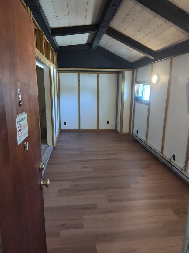 Looking in from the entry door to the living room