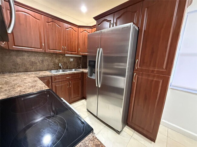 Photo - 1560 W 46th St Unit 115