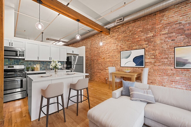 Living Room / Kitchen View 1 - 1525 S Michigan Ave Unit 303