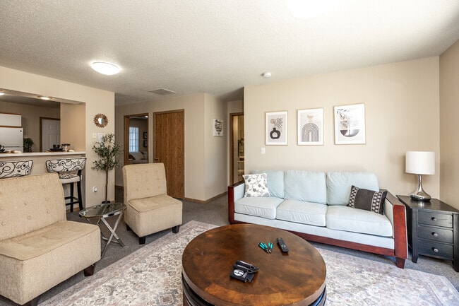 4BR, 2BA - 1,096SF - Living Room - Hillcrest Park Apartments-Student Housing