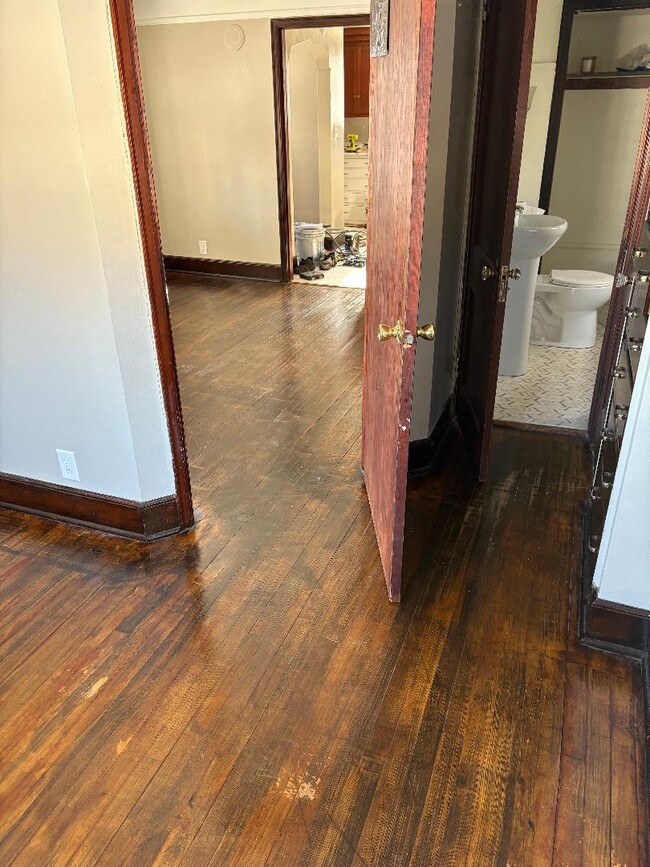 Bathroom/bedroom/living room view - 121 5th Ave SW Unit First Floor